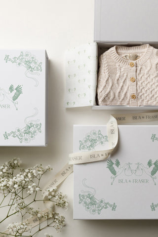Isla & Fraser Baby gift box with baby knitwear and tissue paper