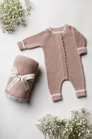 Pink knitted baby blanket and romper gift set