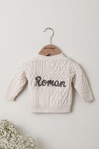 Cable Knit Baby Cardigan in Beige with slate grey 'Roman' name embroidery