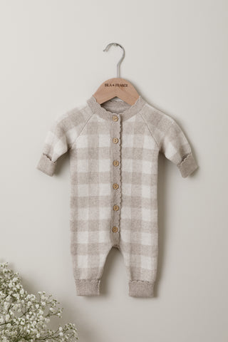 Grey cream gingham check baby romper on an Isla & Fraser hanger