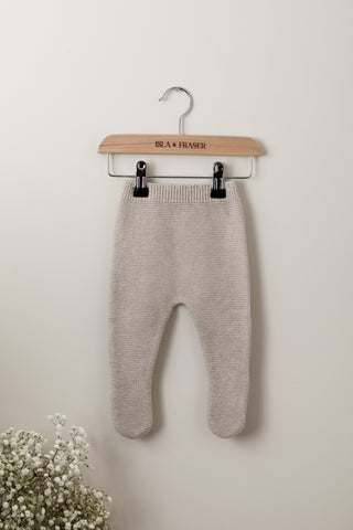 Grey knitted baby trousers on a wooden Isla & Fraser hanger