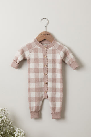 Pink and Cream Checkered Knit Baby Romper on an Isla & Fraser hanger
